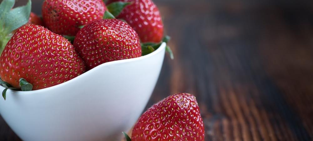 bowl of strawberries on the counter