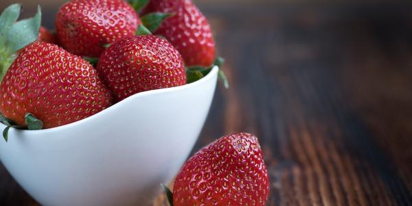 bowl of strawberries on the counter
